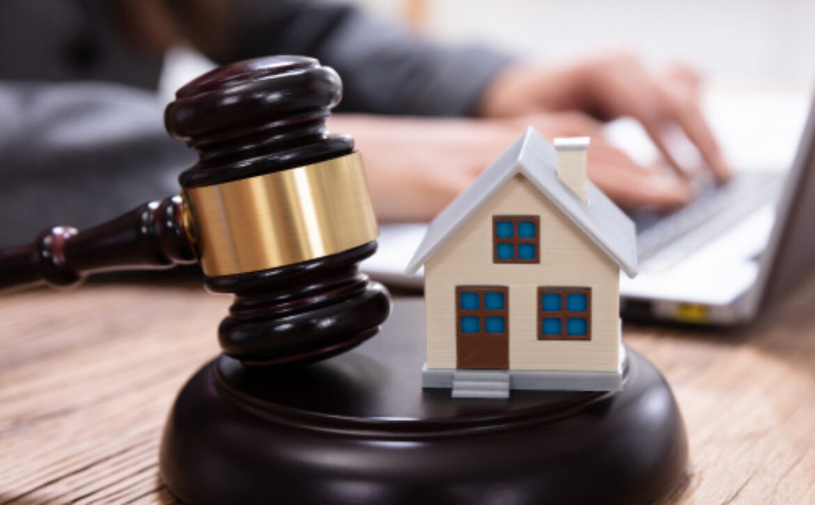 House Auction On The Office Desk